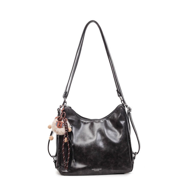 Damen praktische Handtasche mit verspieltem Anhänger Nord Taschen