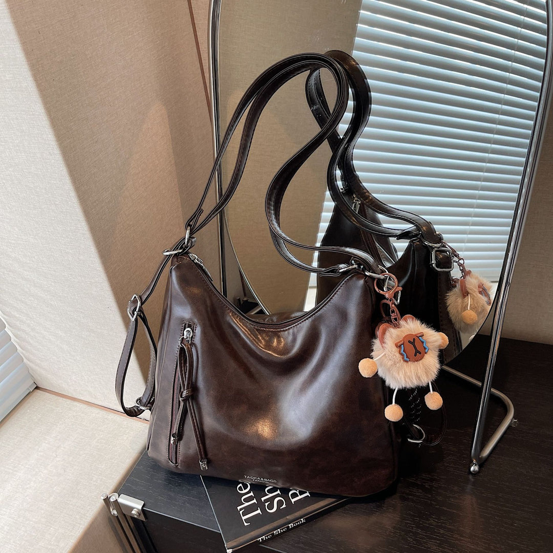 Damen praktische Handtasche mit verspieltem Anhänger Nord Taschen