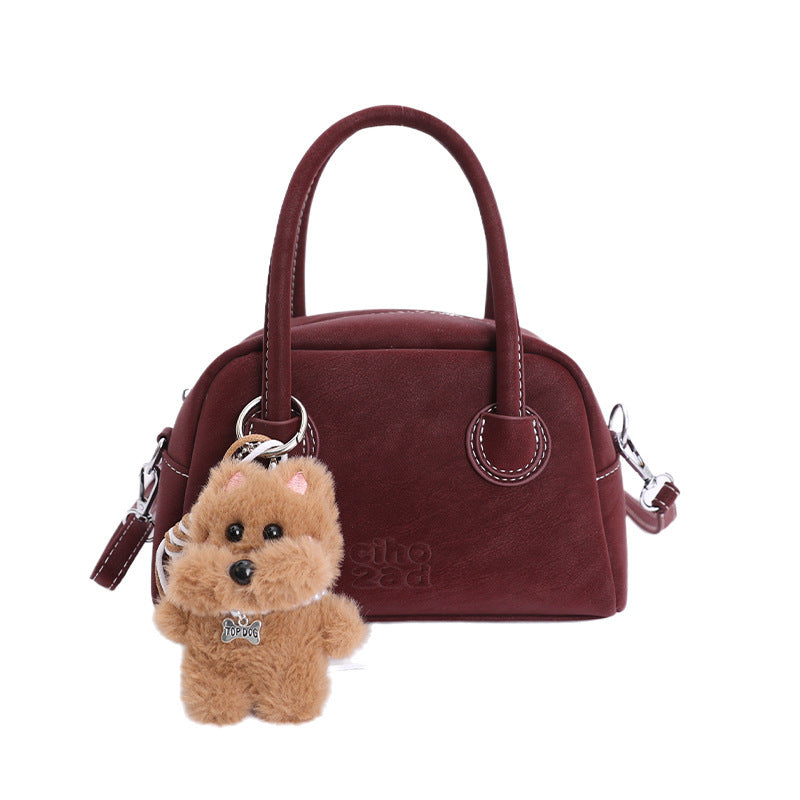Damen-Handtasche mit verspieltem Tieranhänger Nord Taschen