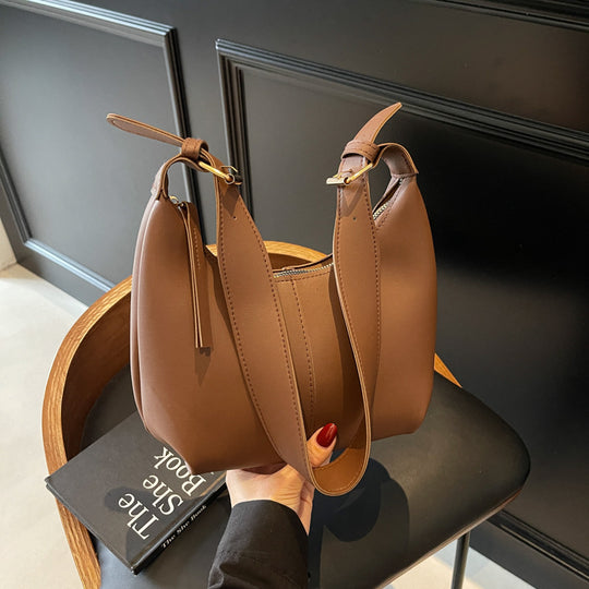 Damen Umhängetasche mit innovativem Design und praktischer Schlaufenbefestigung Nord Taschen