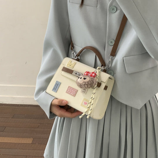 Damenhandtasche mit verspieltem Design und abnehmbarem Anhänger Nord Taschen