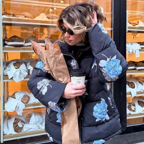 Damen Gepolsterte Oversize-Steppjacke mit Blumenprint und Kapuze Nord Taschen