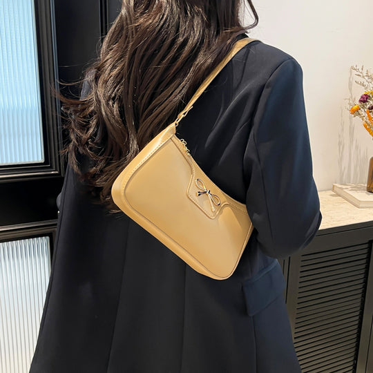 Damen modische Umhängetasche mit eleganter Schleifenapplikation Nord Taschen