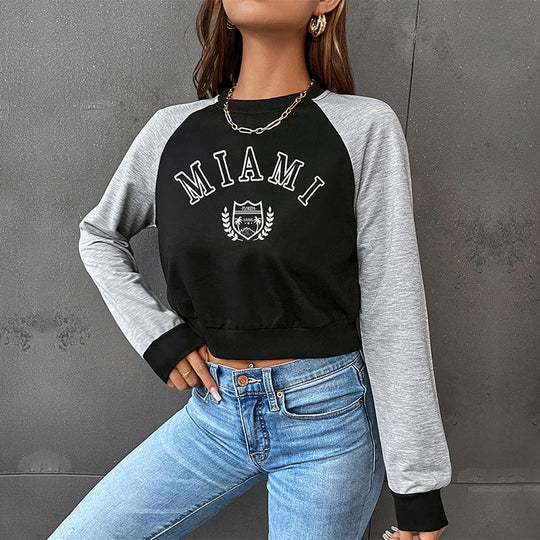 Damen Kurzgeschnittenes College-Cropped-Sweatshirt mit Raglanärmeln und elastischem Saum Nord Taschen