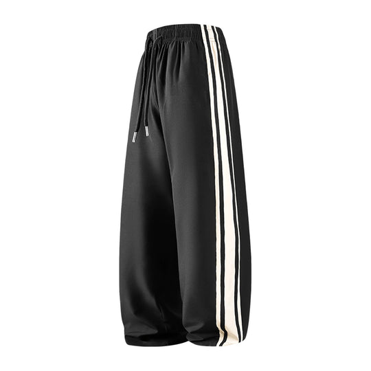 Damen Weite Trackpants mit Tunnelzugbund und seitlichen Kontraststreifen Nord Taschen