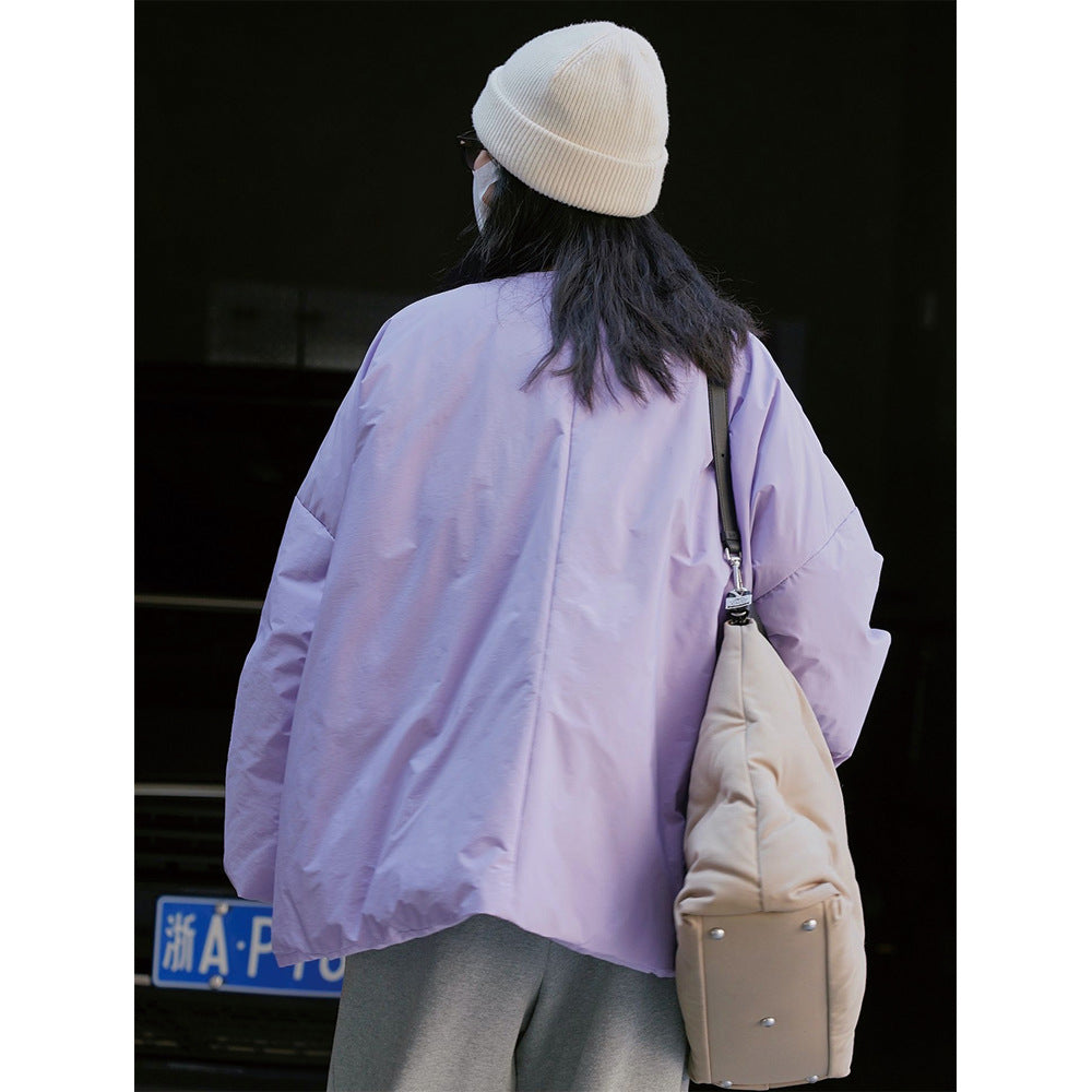 Damen Oversized wattierte Steppjacke mit Rundhalsausschnitt und Druckknopfleiste Nord Taschen