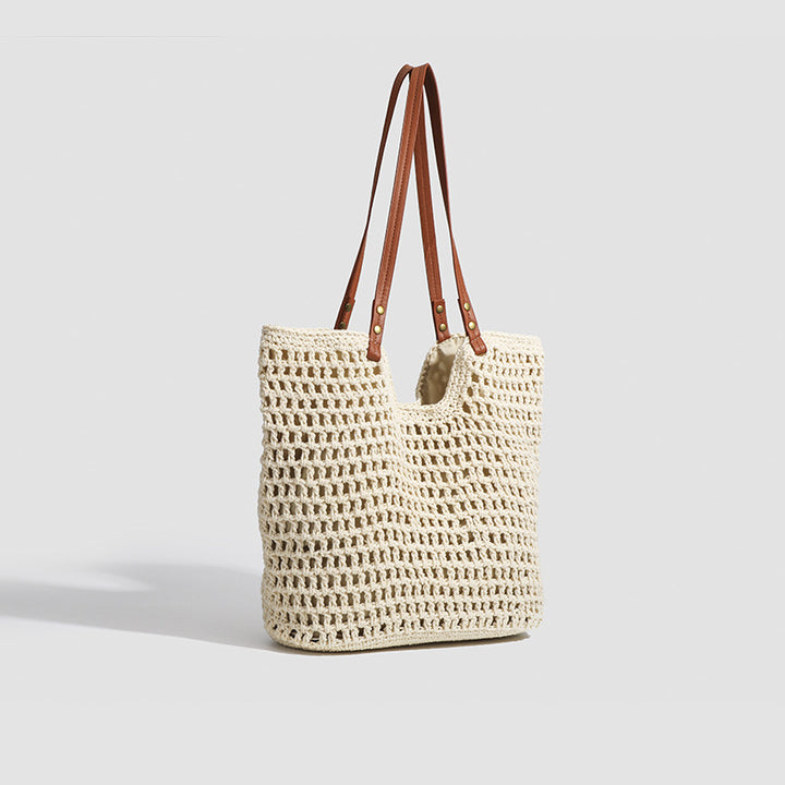 Damen Handtasche aus gewebtem Naturmaterial mit eleganten Lederakzenten Nord Taschen