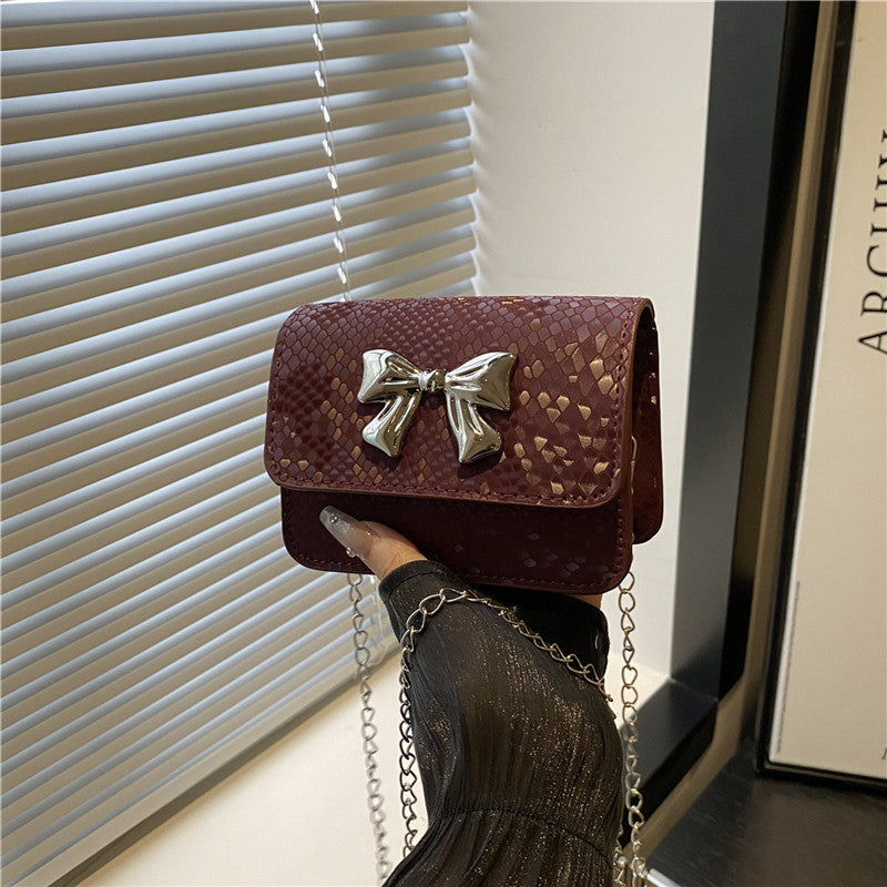 Damen Clutch mit verspieltem Schleifendesign Nord Taschen
