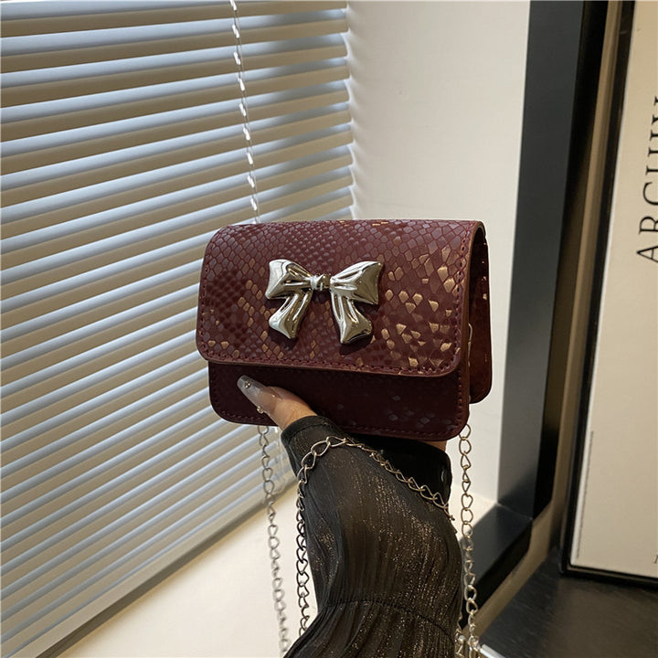 Damen Clutch mit verspieltem Schleifendesign Nord Taschen