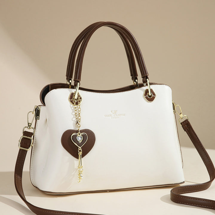 Damen elegante Handtasche mit Herzanhänger Nord Taschen
