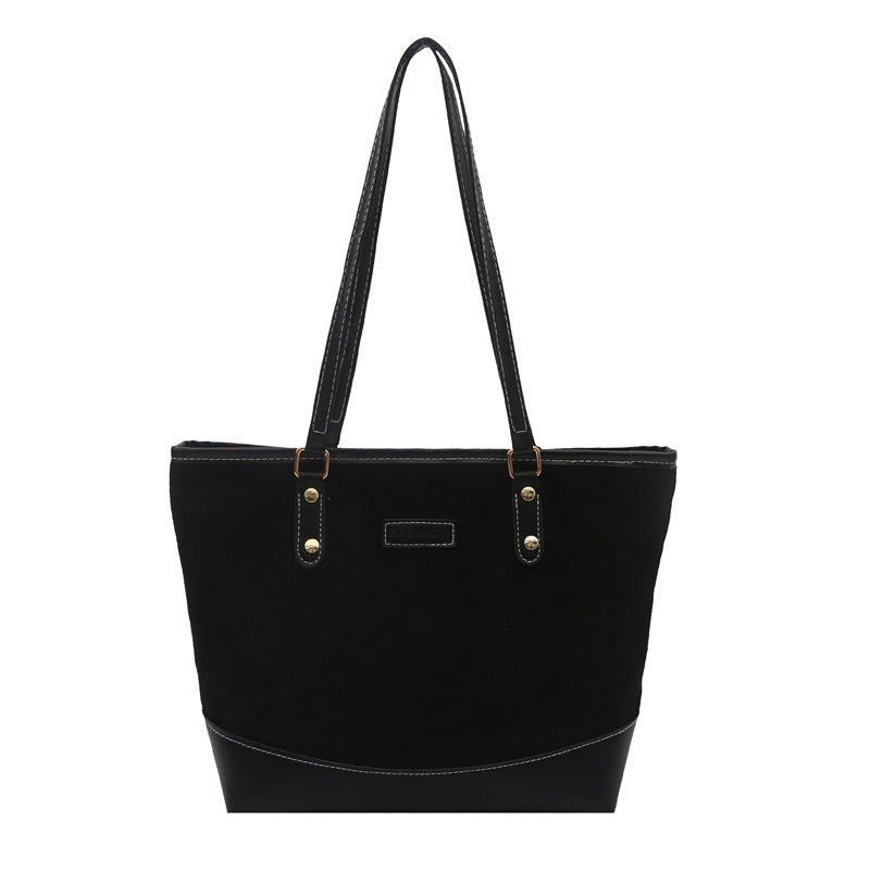 Damen elegante Handtasche mit gestepptem Design und praktischen Seitentaschen Nord Taschen