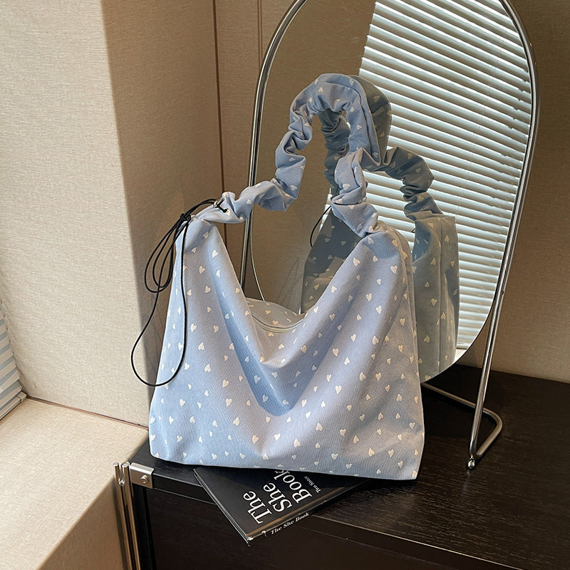 Damen Hobo-Tasche mit verspieltem Herzdesign und elastischen Trageriemen Nord Taschen