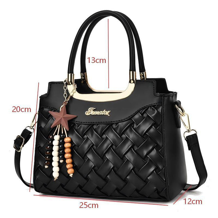 Damen elegante Handtasche mit kunstvollem Flechtmuster und abnehmbarer Quaste Nord Taschen