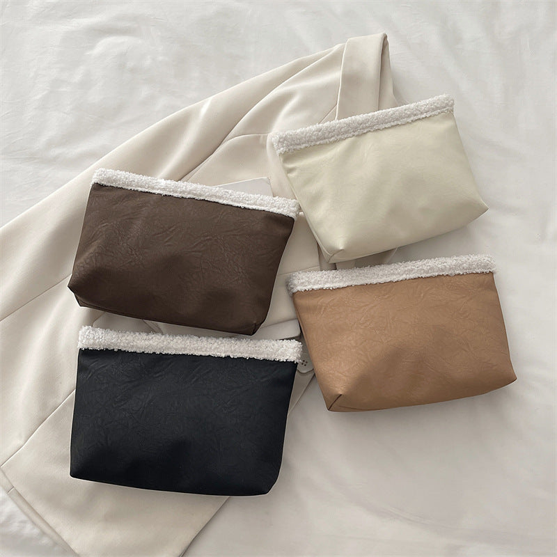 Damen stilvolle Clutch-Tasche aus strukturiertem Material Nord Taschen