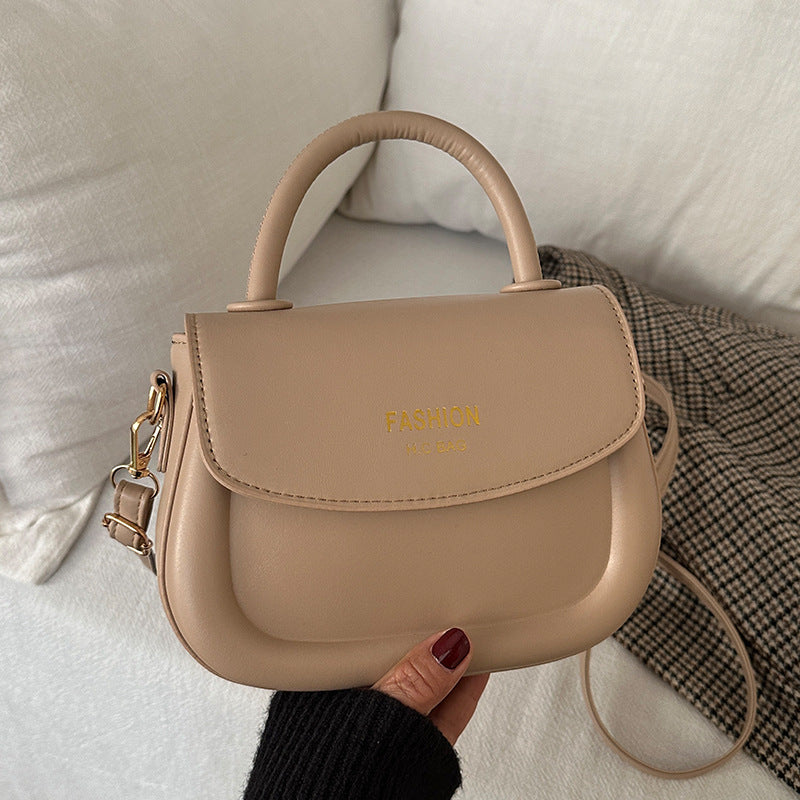 Damen Henkeltasche mit modernem Klappverschluss und eleganten Details Nord Taschen