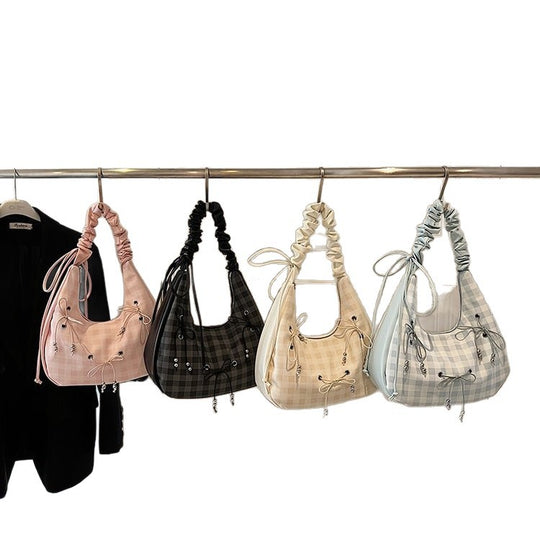 Damen Hobo-Tasche mit dekorativem Kordelzug und glänzenden Akzenten Nord Taschen