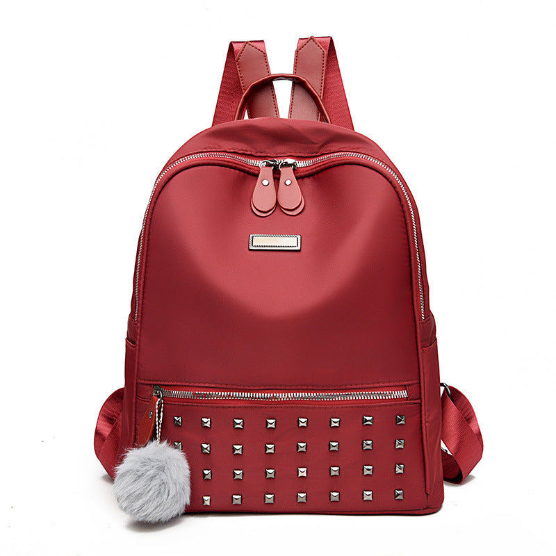 Damen modischer Rucksack mit Nieten und Pom-Pom Nord Taschen