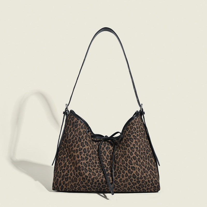 Damen Hobo-Tasche mit tierischem Muster und eleganter Kordelzugverzierung Nord Taschen