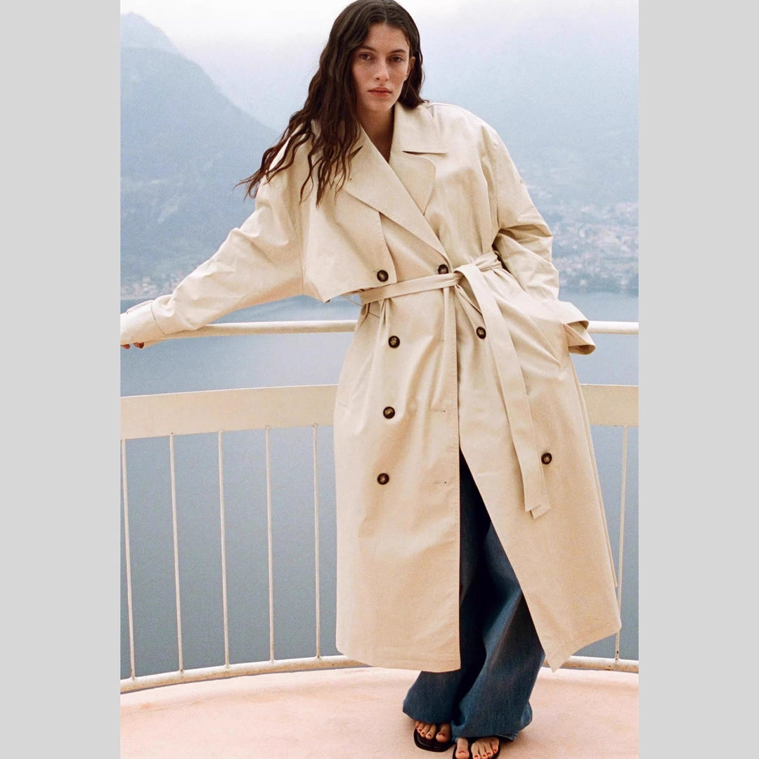 Damen Langer Trenchcoat mit doppelreihiger Knopfleiste, Taillengürtel und breitem Revers Nord Taschen