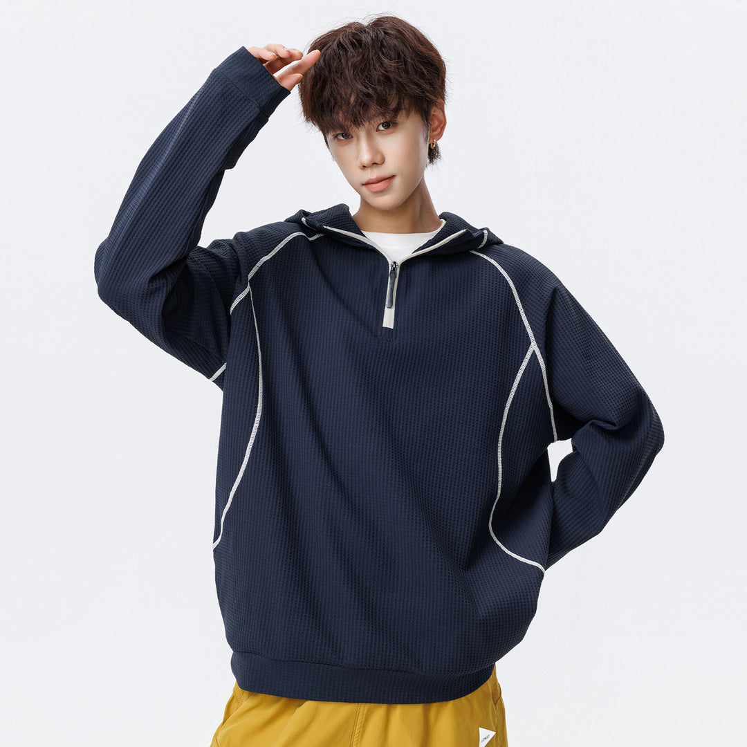 Unisex Oversize Waffelstruktur-Halbzip-Hoodie mit Raglanärmeln und Kontrastpaspeln Nord Taschen
