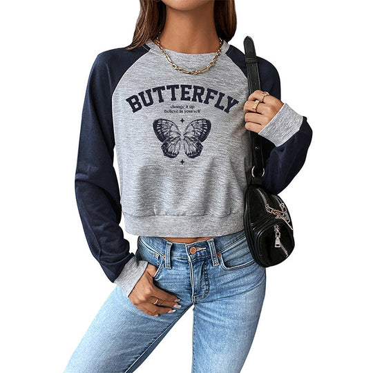 Damen Kurzes Raglan-Sweatshirt mit Schmetterlings-Print und kontrastierenden Ärmeln Nord Taschen