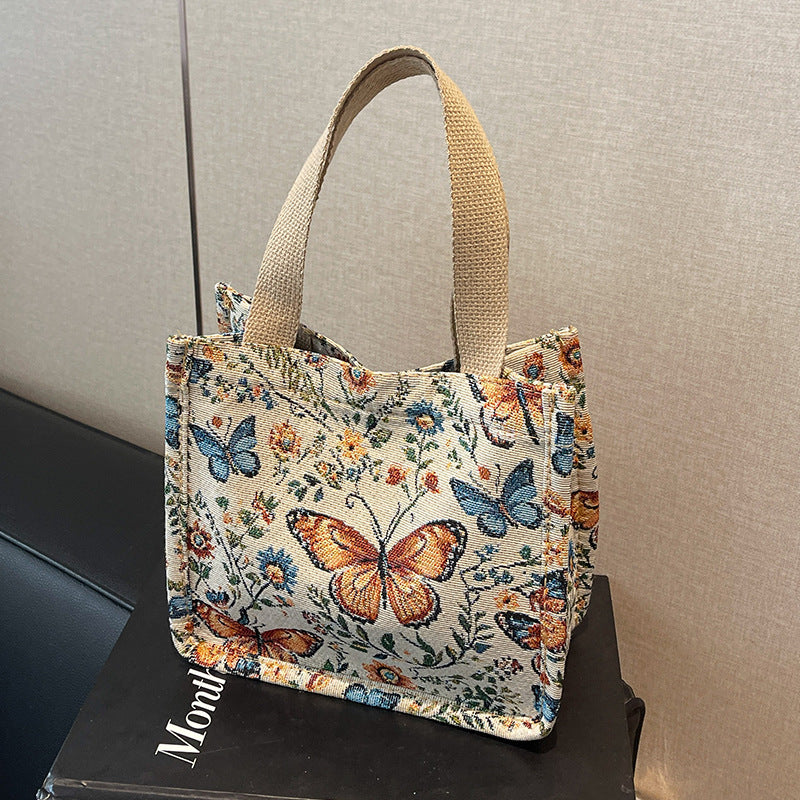 Damen Jute-Shopper mit floralen Schmetterlingsmotiven Nord Taschen