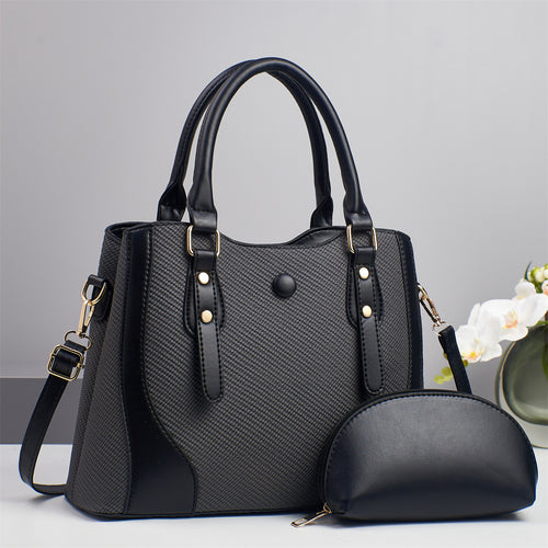 Damen elegante Handtasche mit strukturiertem Obermaterial und abnehmbarer Mini-Clutch Nord Taschen