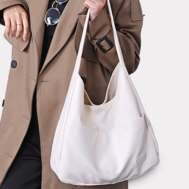 Damen Hobo-Tasche aus hochwertigem Kunstleder mit praktischen Fächer und stilvollem Design Nord Taschen