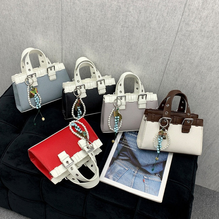 Damen Mini-Handtasche mit verspieltem Anhänger und elegantem Design Nord Taschen