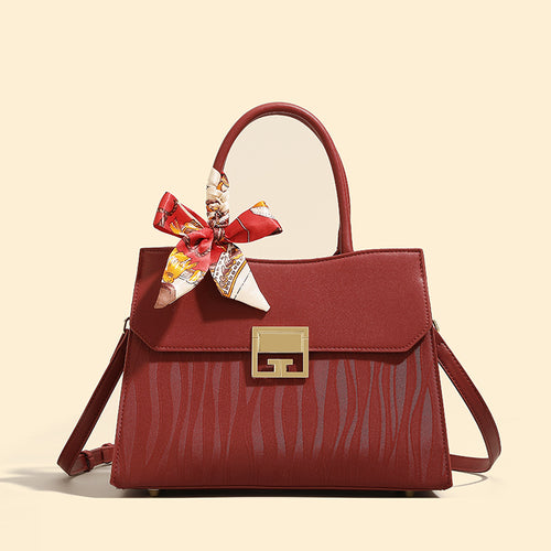 Damen Handtasche mit verstellbarem Schulterriemen und elegantem Schleifenakzent Nord Taschen