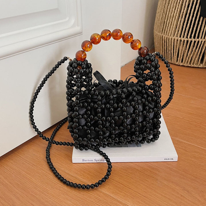 Damen elegante Perlenhandtasche mit strukturiertem Design Nord Taschen