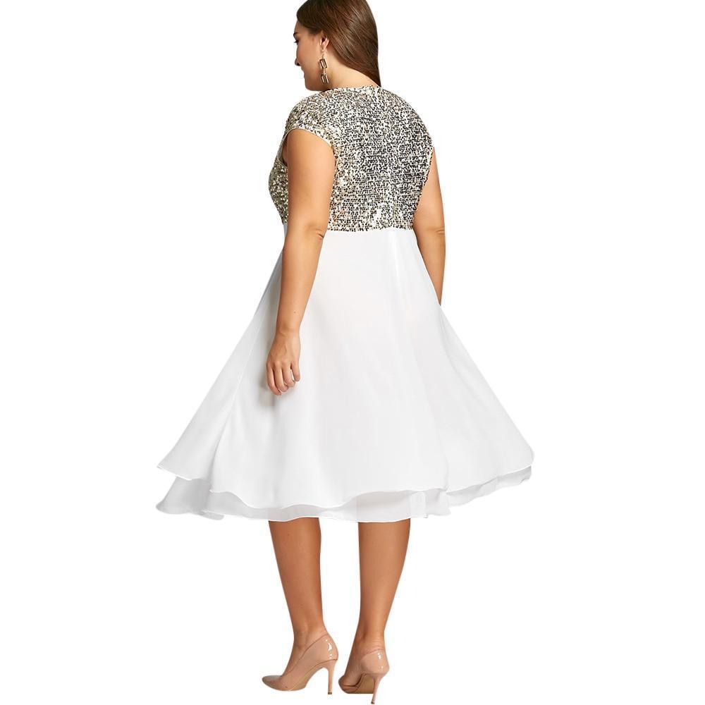 Damen Elegantes Cocktailkleid mit schimmerndem Oberteil und schwingendem Rock Nord Taschen