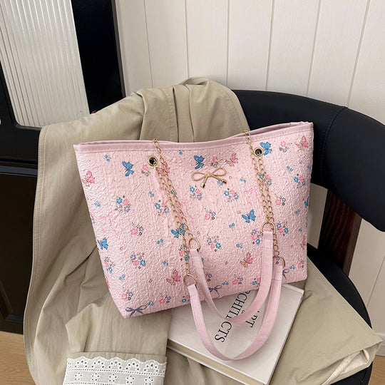 Damen Einkaufstasche mit floralem Design und elegantem Kettenakzent Nord Taschen