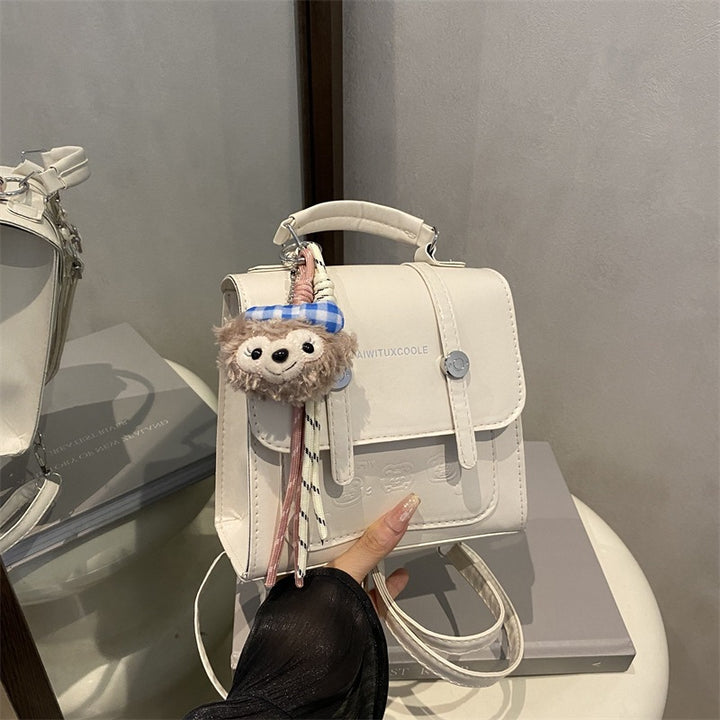 Damen modische Mini-Rucksacktasche mit verspieltem Anhänger Nord Taschen