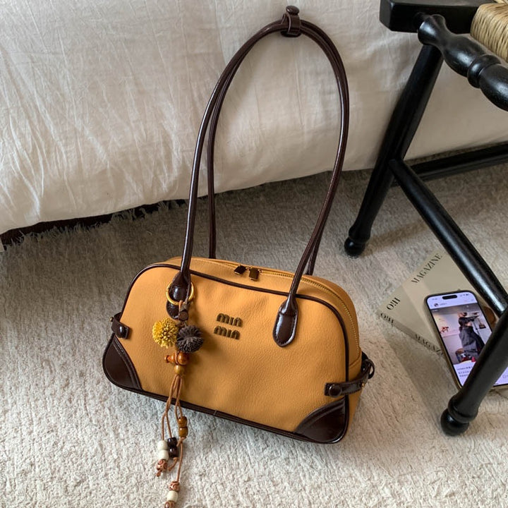 Damen elegante Handtasche mit verspielten Anhängern Nord Taschen