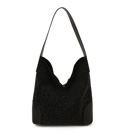 Damen Hobo-Tasche aus weichem Veloursleder mit eleganter Silhouette Nord Taschen