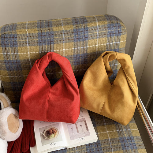 Damen Schultertasche aus weichem Veloursleder mit modernem Knotenakzent Nord Taschen