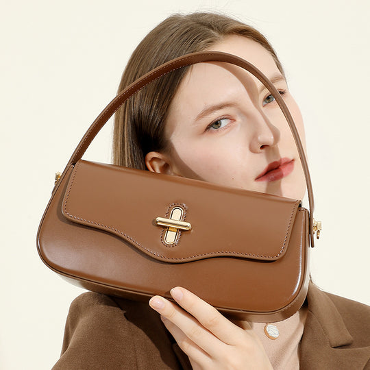 Damen elegante Umhängetasche mit feinem Leder und goldenen Akzenten Nord Taschen