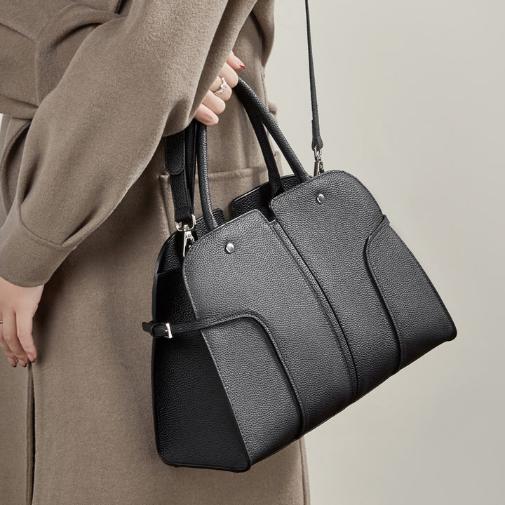 Damen Handtasche mit modernem Schnitt und praktischen Fächern Nord Taschen