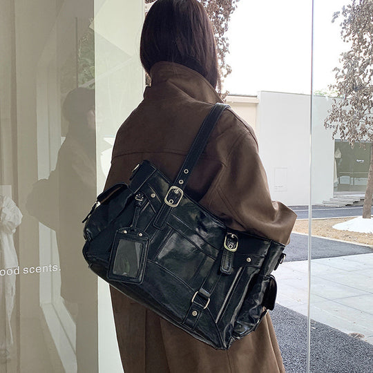 Damen Schultertasche mit multifunktionalen Fächern und stylishen Reißverschlussdetails Nord Taschen