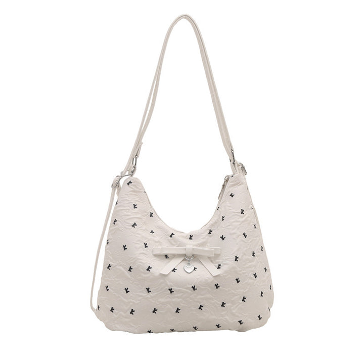Damen Hobo-Tasche mit eleganter Struktur und charmanten Dekorelementen Nord Taschen