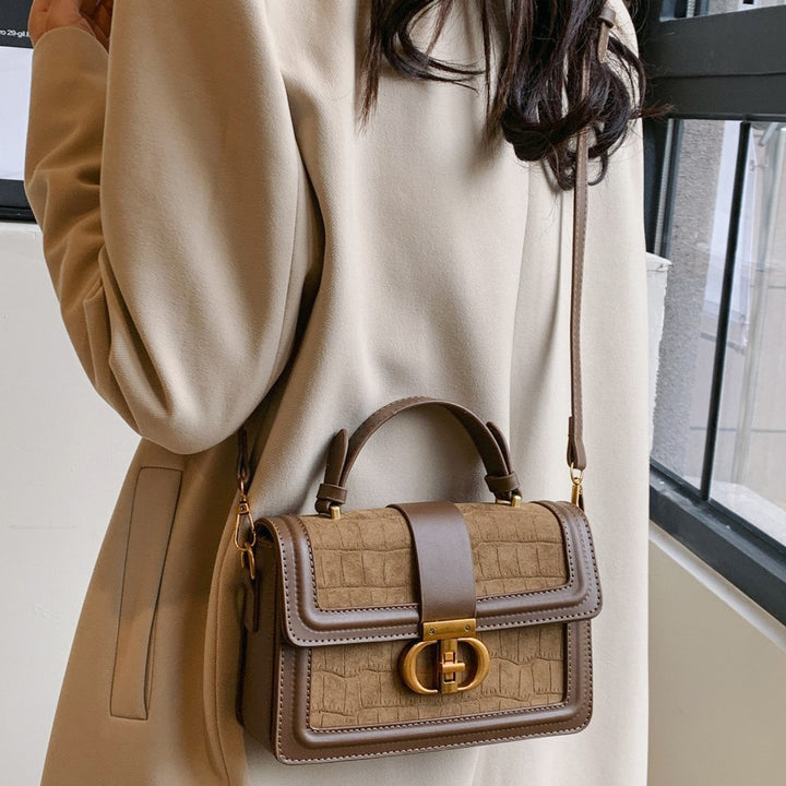 Damen elegante Handtasche mit Krokodilprägung und goldenen Akzenten Nord Taschen