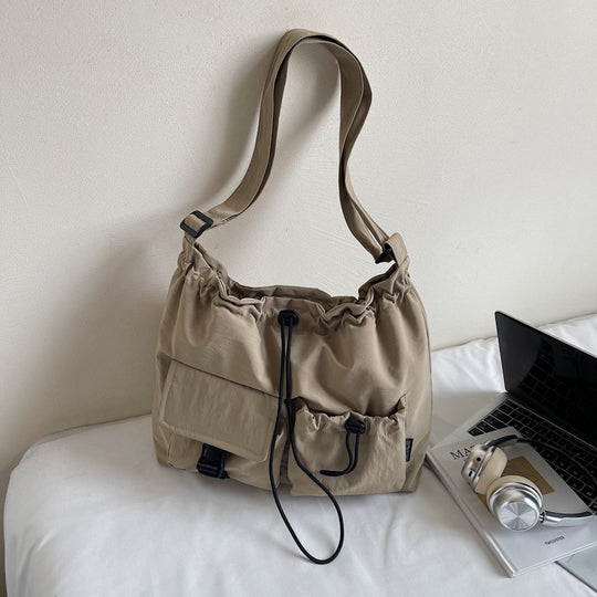 Damen Umhängetasche mit verstellbarem Kordelzug und praktischen Taschen Nord Taschen