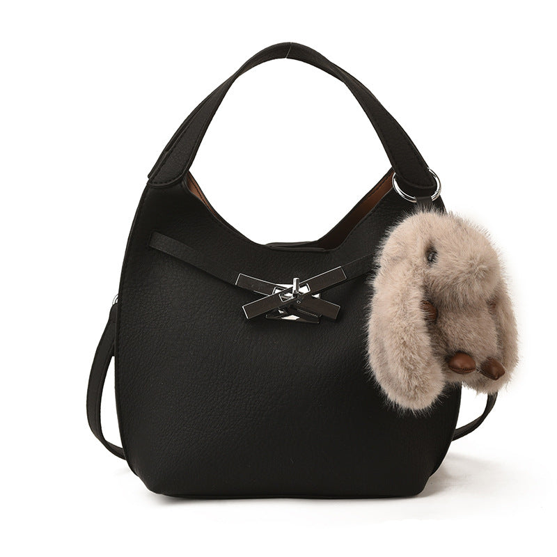 Damen modische Henkeltasche mit plüschigem Anhänger Nord Taschen