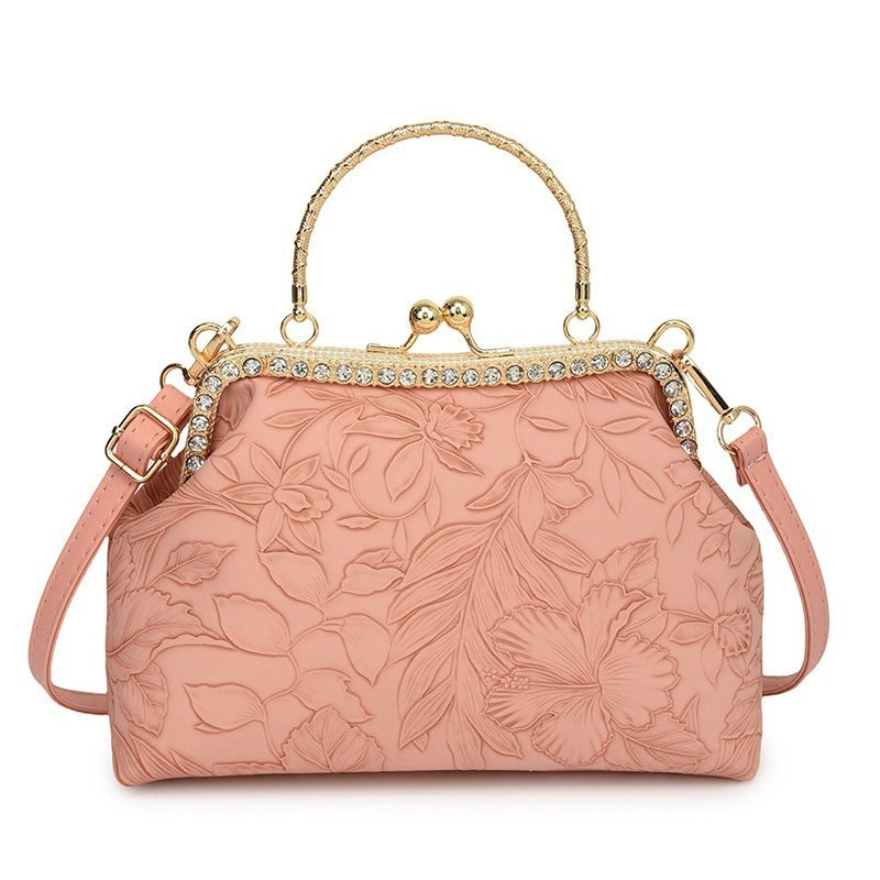 Damen elegante Handtasche mit floralem Relief und goldenen Akzenten Nord Taschen