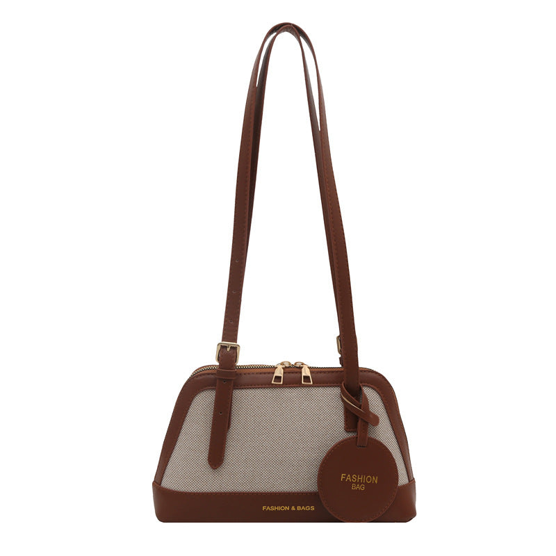 Damen Umhängetasche mit strukturiertem Gewebe und elegantem Detail Nord Taschen
