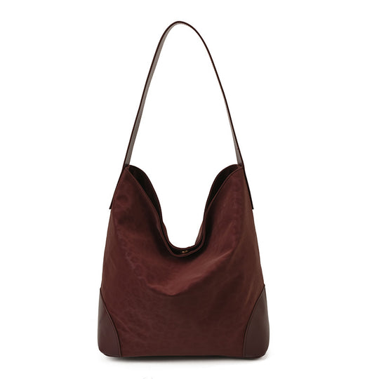 Damen Hobo-Tasche aus weichem Veloursleder mit eleganter Silhouette Nord Taschen