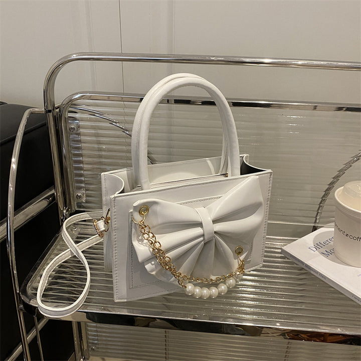 Damen elegante Handtasche mit Schleifenakzent und Perlenverzierung Nord Taschen