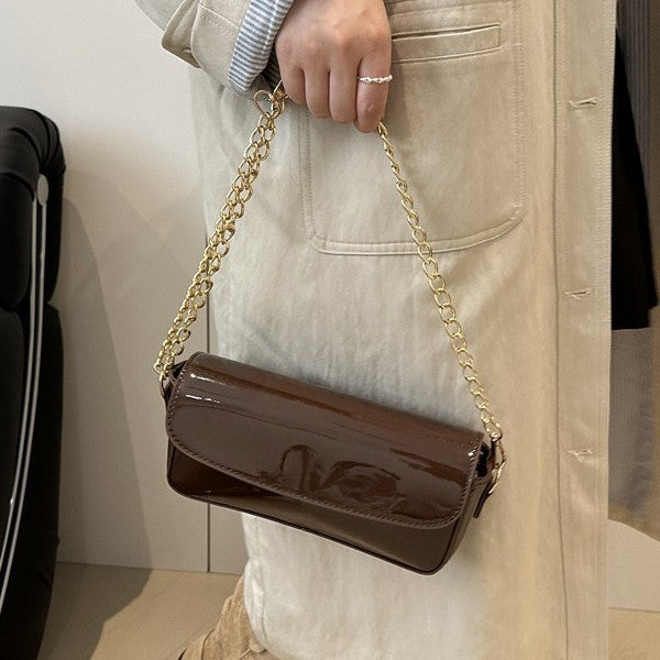 Damen elegante Clutch mit Kettenakzenten Nord Taschen