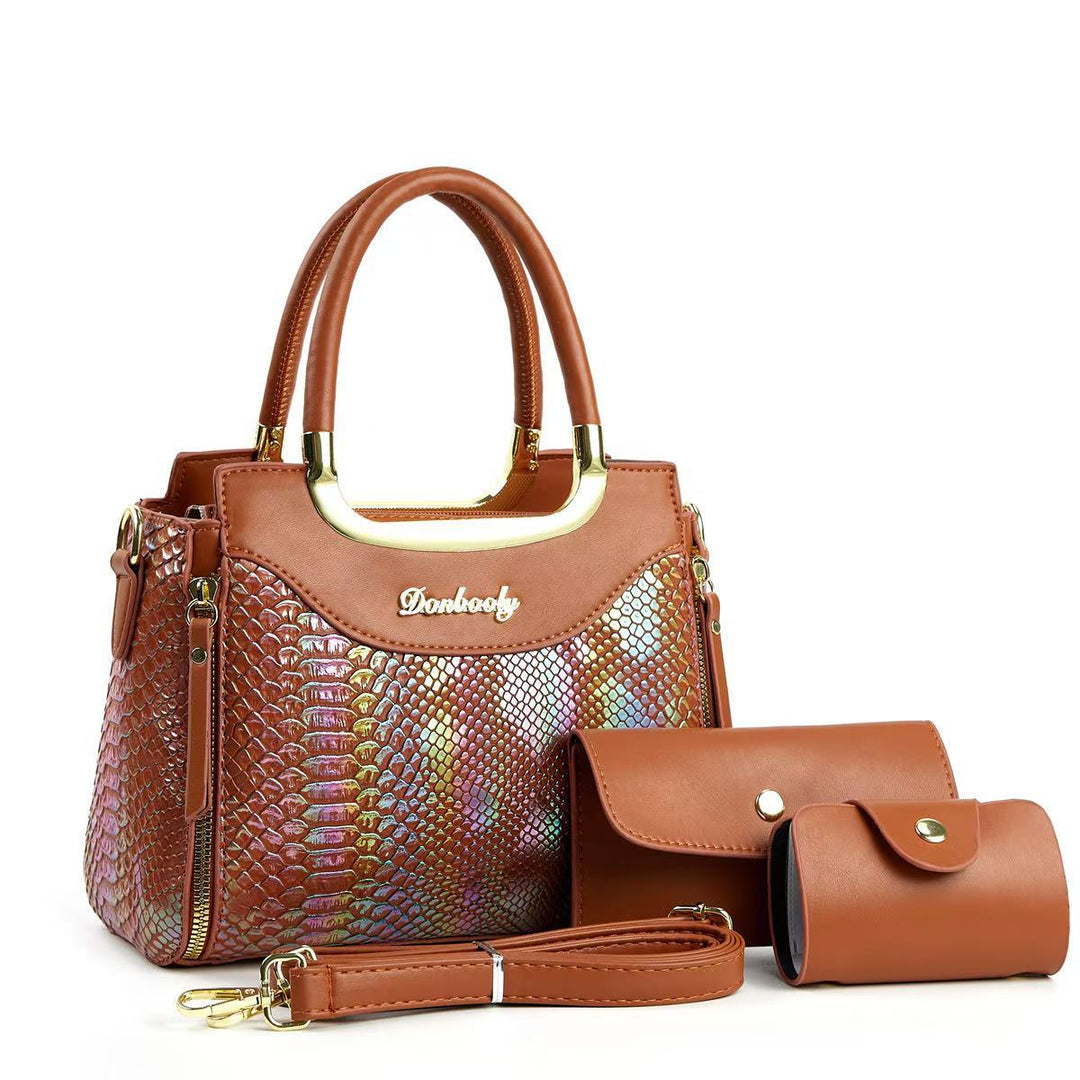 Damen stilvolle Handtasche mit Schlangenleder-Optik und abnehmbaren Accessoires Nord Taschen